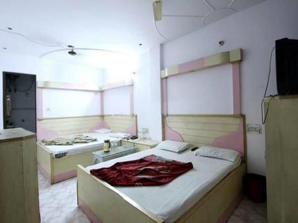 Hotel Hans International Nueva Delhi Habitación foto